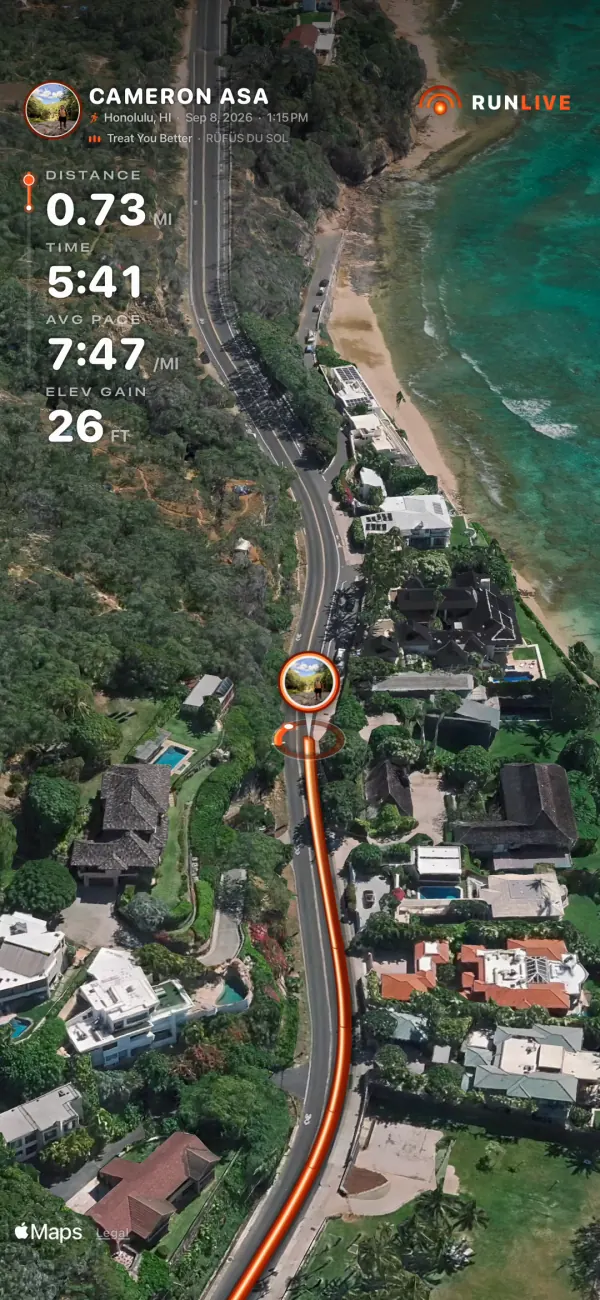 A frame of the film: the flyover over Diamond Head with the trail drawing itself along the road